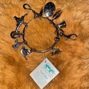 Key bracelet with charms by green rhino